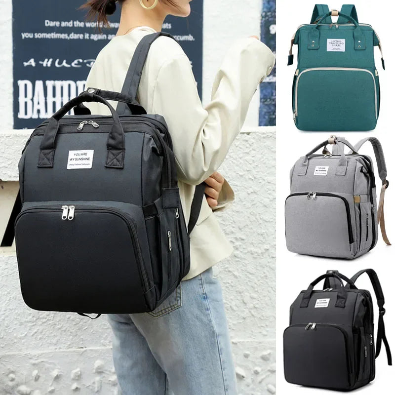 Mochila para bebe 3 en 1 con cuna portátil y gran capacidad de almacenaje