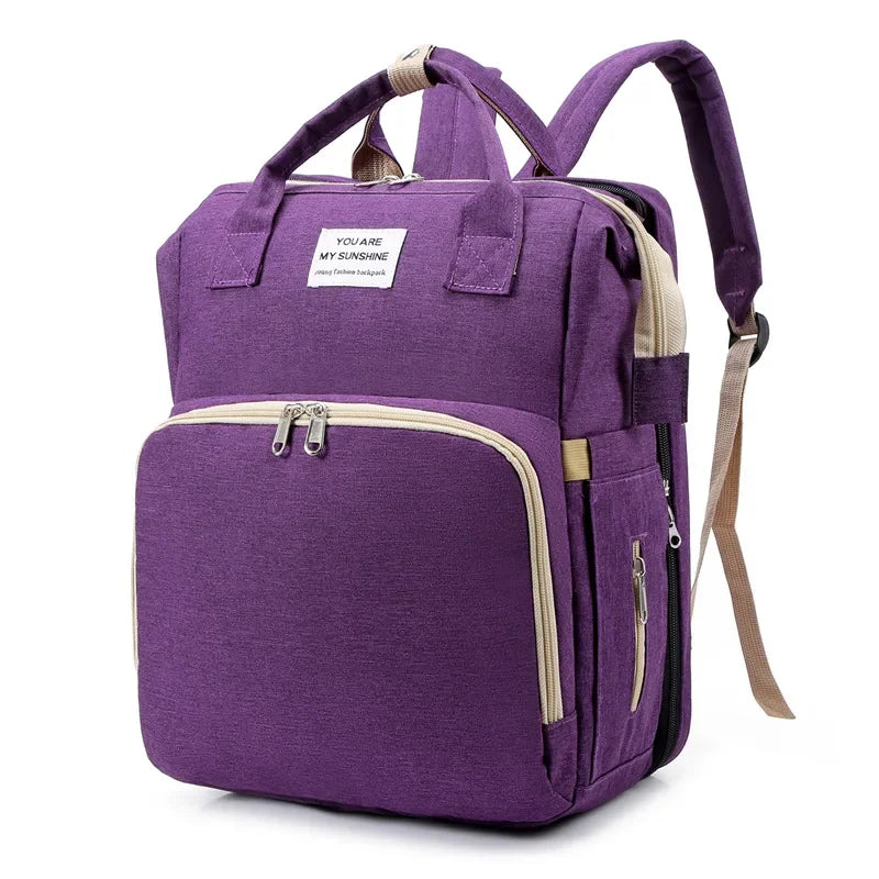 Mochila para bebe 3 en 1 con cuna portátil y gran capacidad de almacenaje