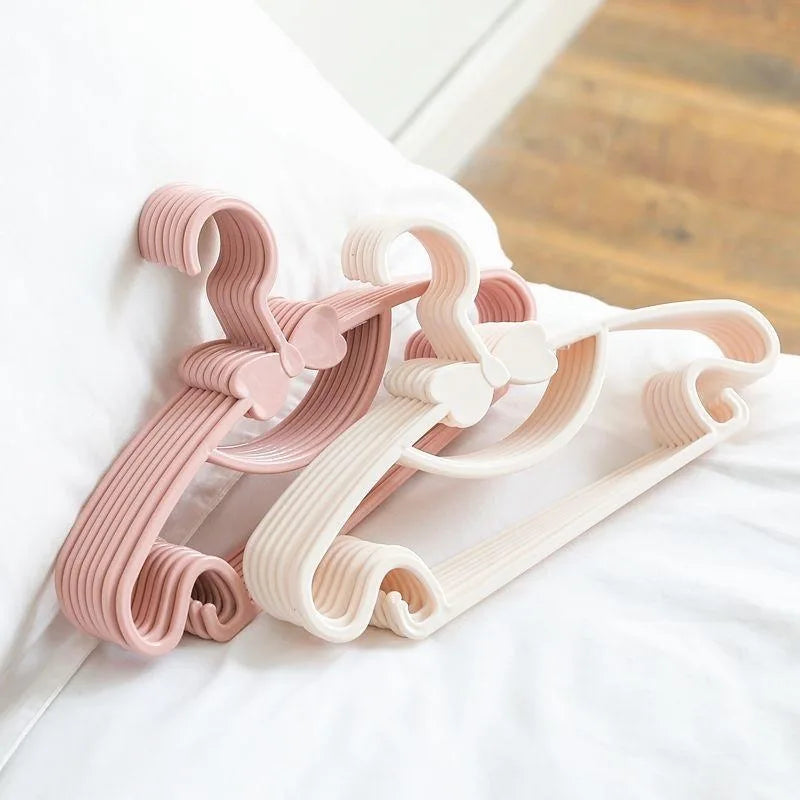 Set de Perchas de Plástico Portátiles Estilo Macaron para Ropa de Bebé - Organizador Infantil Antiviento