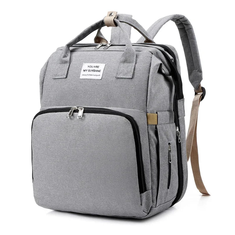 Mochila para bebe 3 en 1 con cuna portátil y gran capacidad de almacenaje