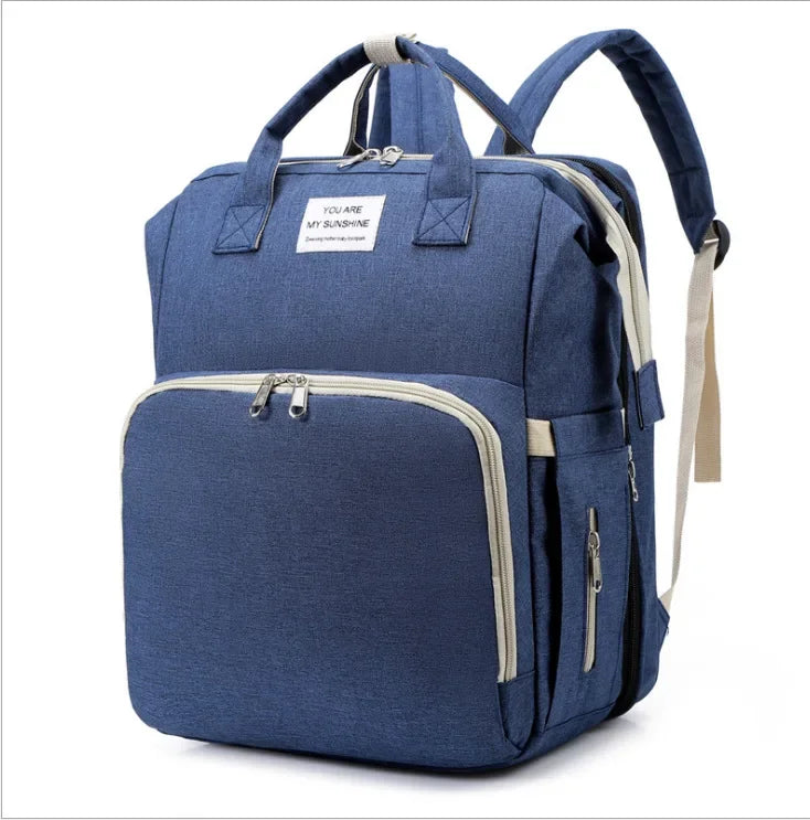 Mochila para bebe 3 en 1 con cuna portátil y gran capacidad de almacenaje