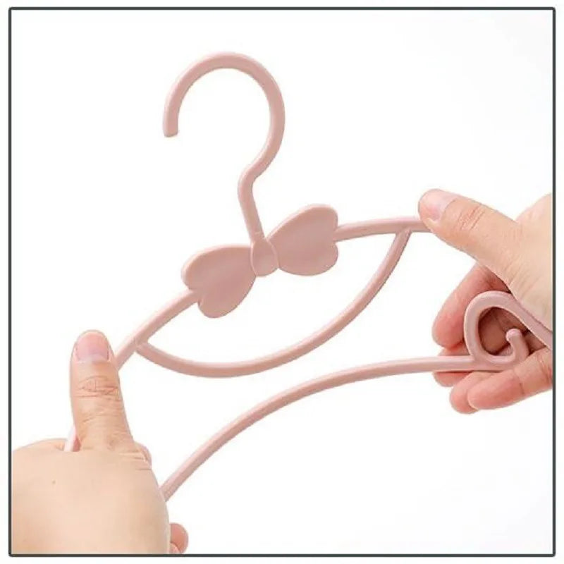 Set de Perchas de Plástico Portátiles Estilo Macaron para Ropa de Bebé - Organizador Infantil Antiviento